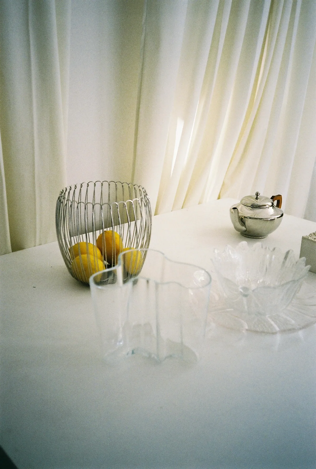 Silver and glassware on an afternoon table